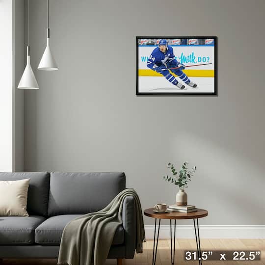 Auston Matthews Toronto Maple Leafs Framed 20" x 29" Skating Canvas 31.5" x 22.5"
